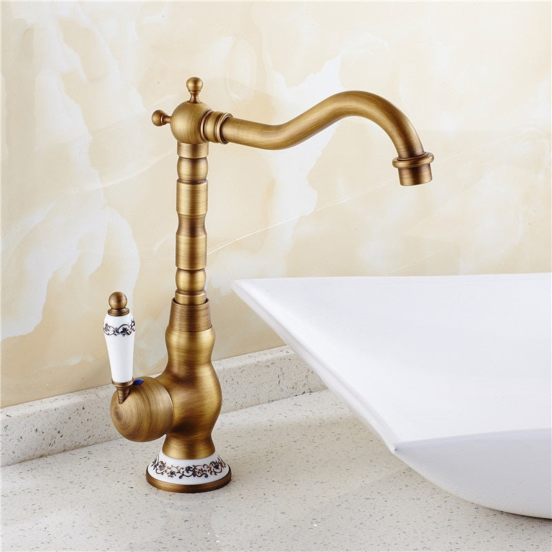 シンクの浴室の蛇口の洗面器のミキサータップアンティーク真鍮セラミックデッキに取り付けられたレトロな磁器のハンドルの蛇口